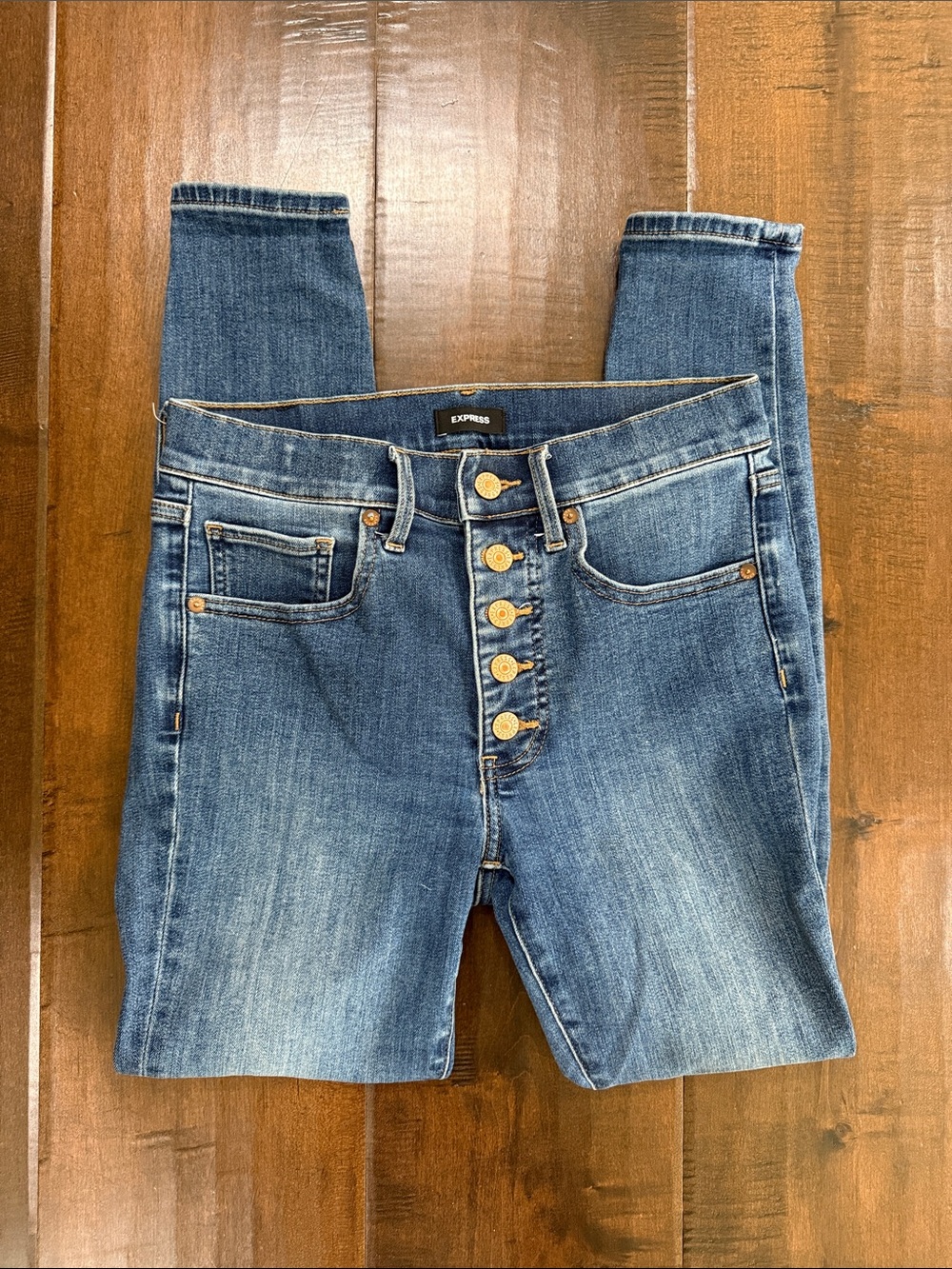 Express Women's Skinny Jeans in Medium Blue Wash with Button Fly